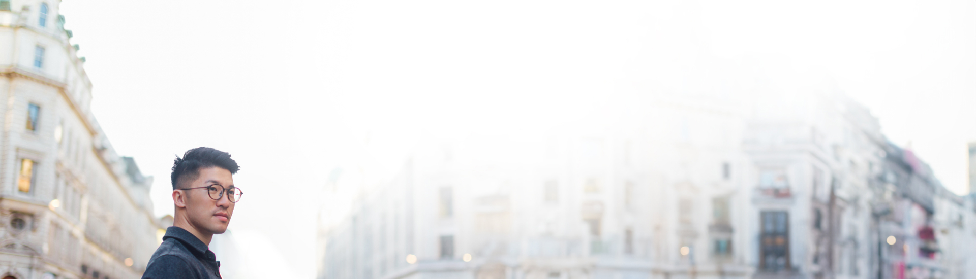 Person Standing in City